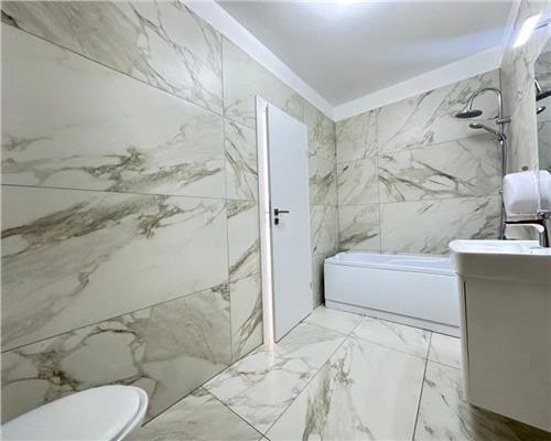 Apartament 2 camere 56 mpu cu balcon si parcare zona Supeco