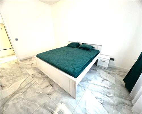 Dezvoltator vand studio 40 mp utili cu parcare boxa zona Brana