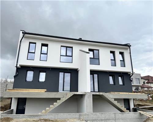 Casa cu 4 camere 2 bai si 300 mp teren in zona Calea Cisnadiei
