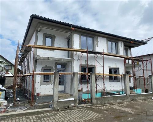 Casa cu 4 camere 2 bai si curte 180 mp in Selimbar
