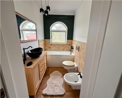 Casa mobilata 120 mpu 4 camere 2 bai cu teren 500 mp 10 min de Sibiu