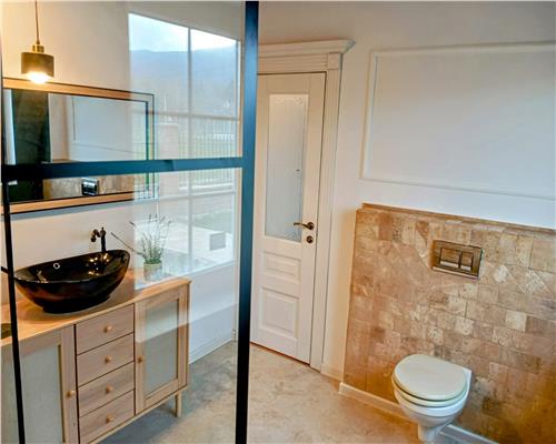 Casa mobilata 120 mpu 4 camere 2 bai cu teren 500 mp 10 min de Sibiu