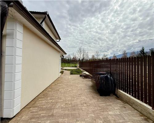 Casa mobilata 120 mpu 4 camere 2 bai cu teren 500 mp 10 min de Sibiu