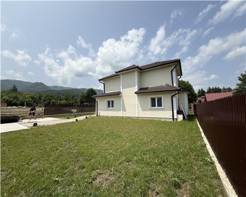 Casa mobilata 120 mpu 4 camere 2 bai cu teren 500 mp 10 min de Sibiu