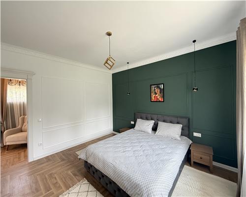 Casa mobilata 120 mpu 4 camere 2 bai cu teren 500 mp 10 min de Sibiu