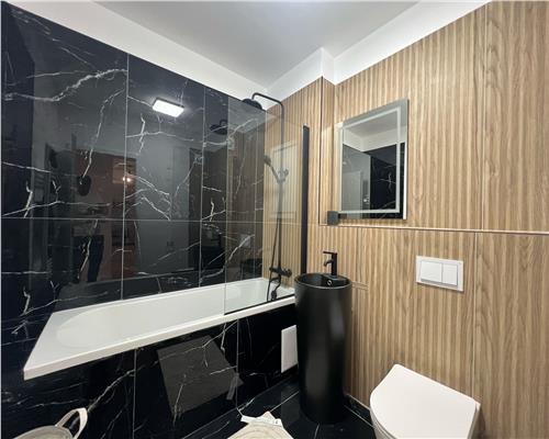 Apartament mobilat 60 mp utili la etajul 1 cu 2 camere terasa 12 mp