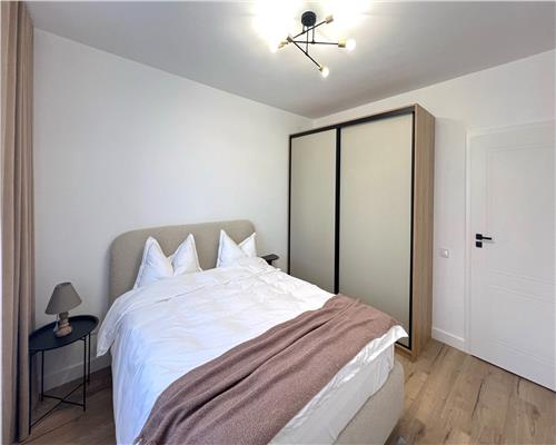 Apartament mobilat 60 mp utili la etajul 1 cu 2 camere terasa 12 mp