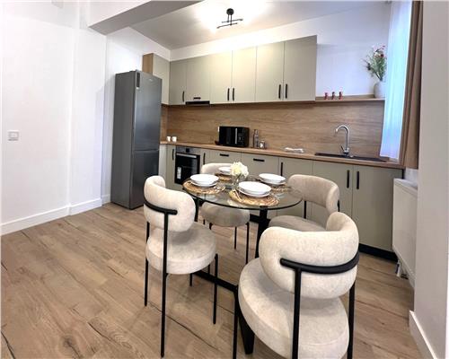 Apartament mobilat 60 mp utili la etajul 1 cu 2 camere terasa 12 mp