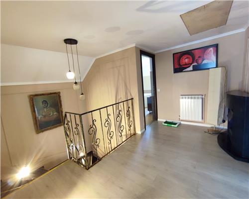 Casa cu 4 camere 3 bai garaj inchis si teren 550 mp in Tocile