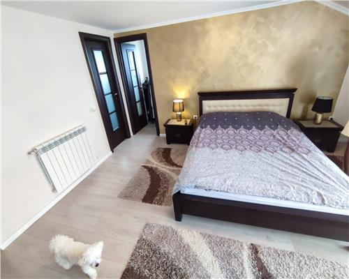 Casa cu 4 camere 3 bai garaj inchis si teren 550 mp in Tocile