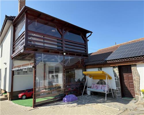 Casa moderna cu 4 camere 2 bai si 831 mp teren in Sura Mica