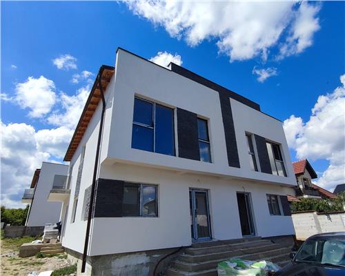Casa intabulata cu 4 camere 2 bai si curte pe Calea Cisnadiei