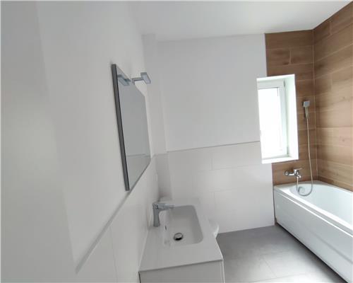Apartament modern 2 camere 2 bai terasa acoperita si curte in Selimbar
