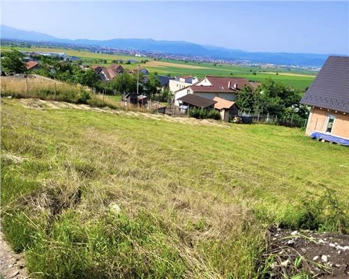 Teren intravilan cu utilitati si priveliste spre Sibiu in zona Sura Mare