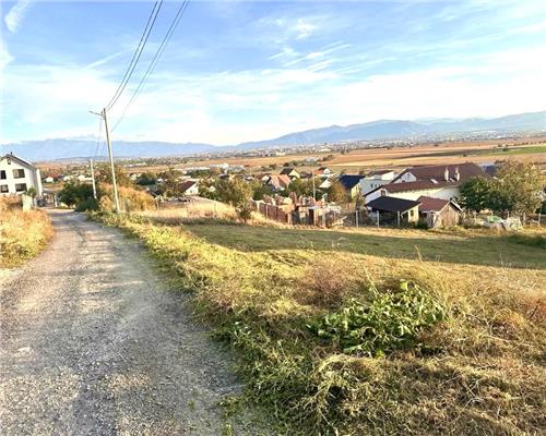 Teren intravilan cu utilitati si priveliste spre Sibiu in zona Sura Mare