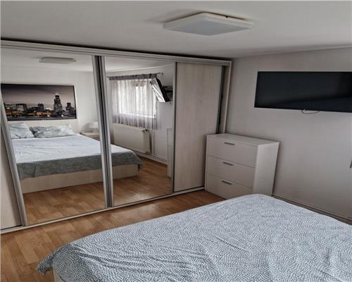 Apartament modern pe 2 niveluri 4 camere 2 bai si 82.4 mpu in Sibiu