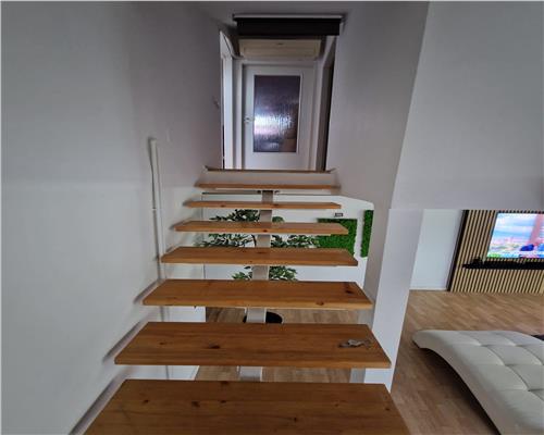 Apartament modern pe 2 niveluri 4 camere 2 bai si 82.4 mpu in Sibiu
