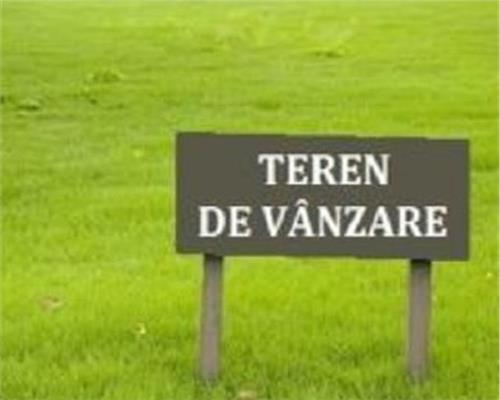 Teren intravilan 1570 mp utilitati intre case pe strada asfaltata