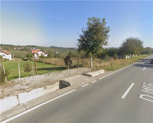 Teren intravilan 1570 mp utilitati intre case pe strada asfaltata