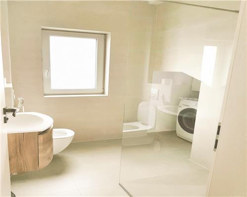 Casa noua prima inchiriere 4 camere Cisnadioara teren 500 mp