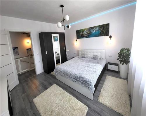 Casa moderna 3 camere 2 bai si curte in zona Lidl