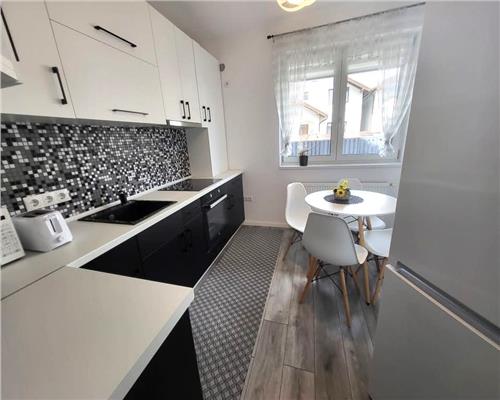 Casa moderna 3 camere 2 bai si curte in zona Lidl