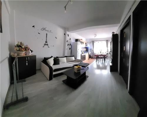 Apartament complet mobilat situat la parter,cu 2 camere si parcare privata