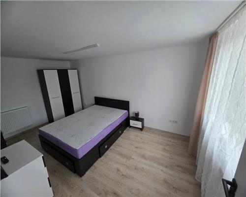 Garsoniera la curte in cartierul Strand